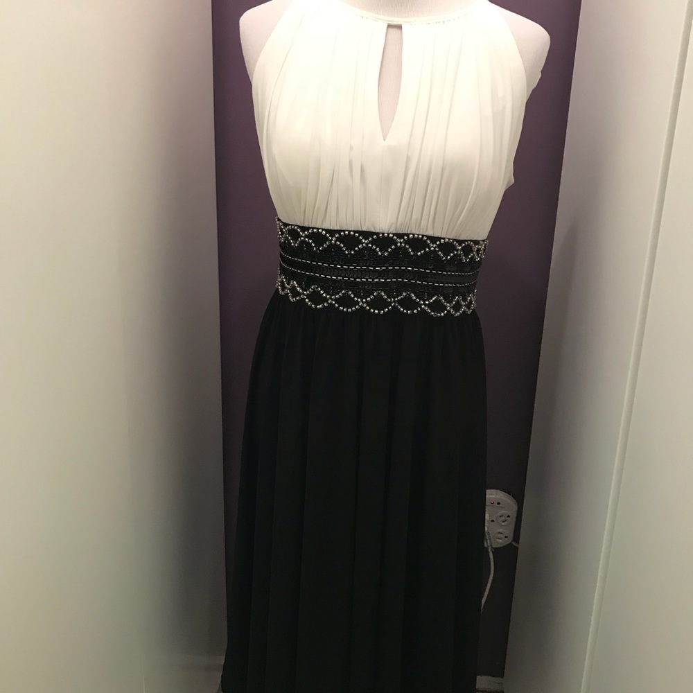 Formal black and white dress with beaded detail